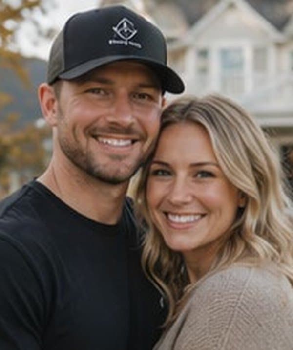 Placeholder portrait of a couple outside a home